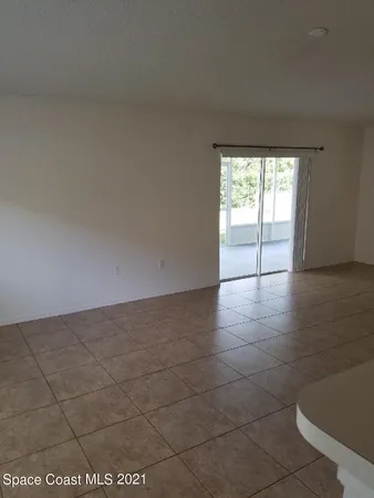 a view of a kitchen with a sink