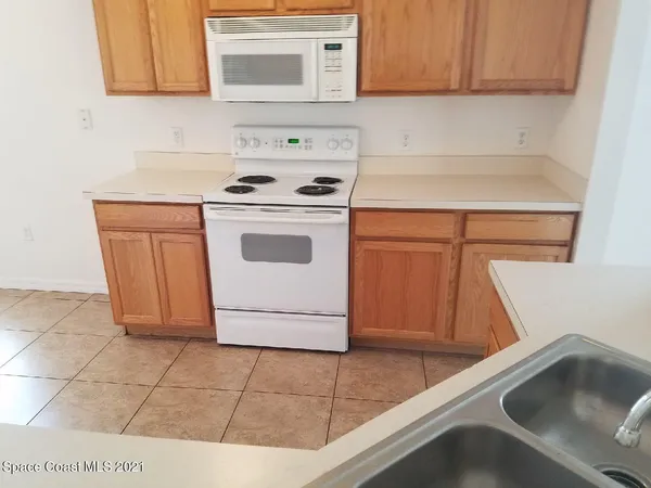 a view of a room that has a window in it