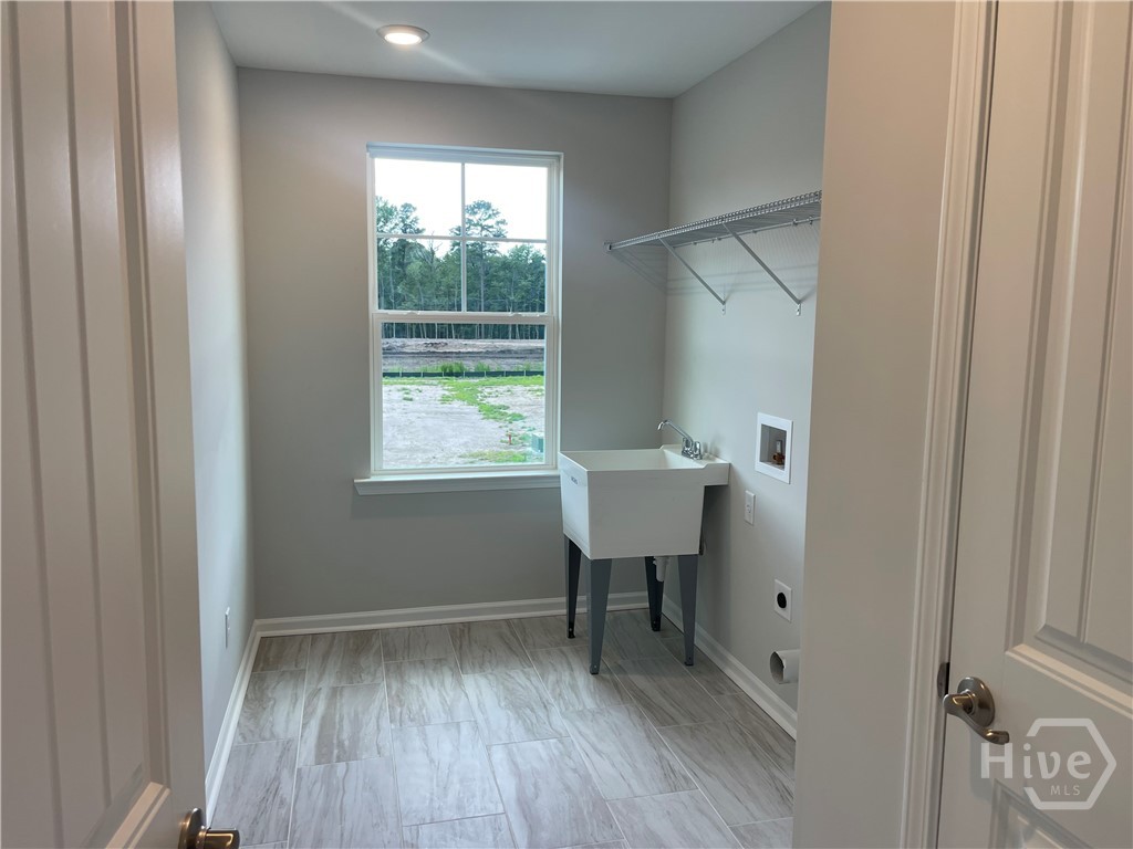 185 Champlain Drive Pooler, GA 31322 - Photo 21 of 26 Upstairs Laundry Rom