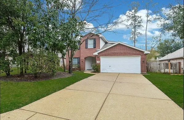 $380,000 | 42 West Drifting Shadows Circle, Conroe, TX 77385