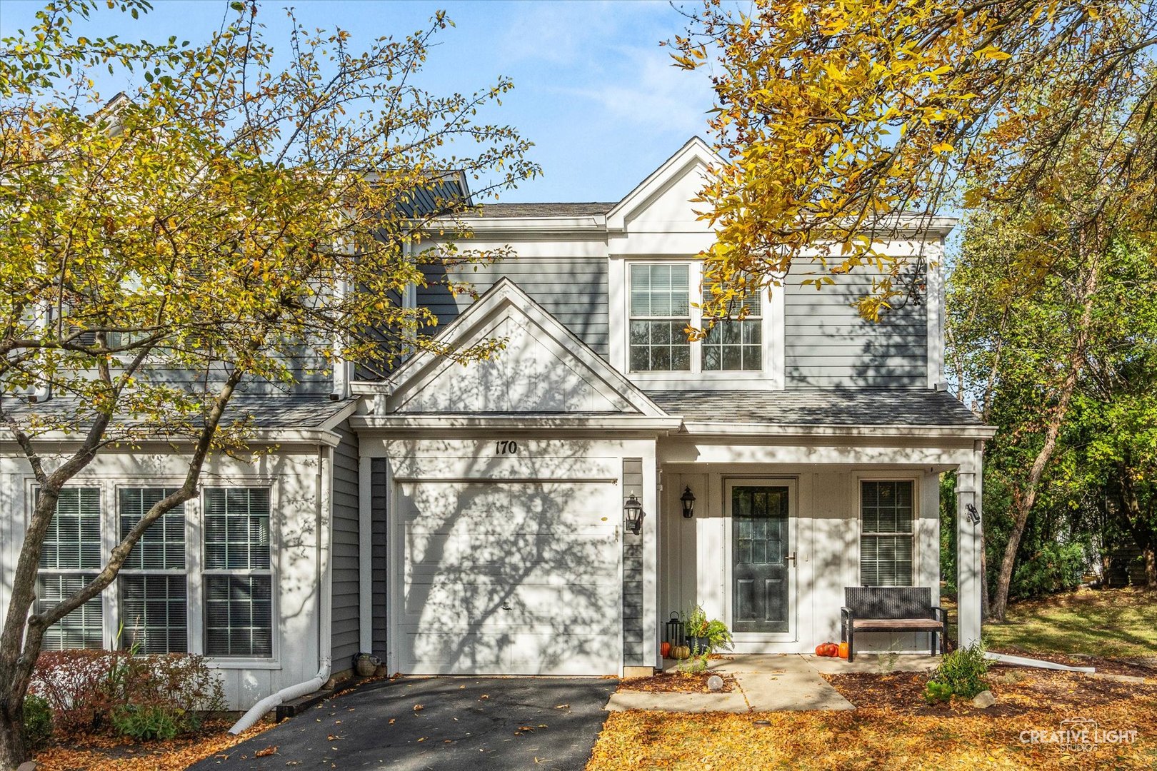 170 Half Moon Circle Aurora, IL 60504 - Photo 2 of 15 a front view of a house with garden