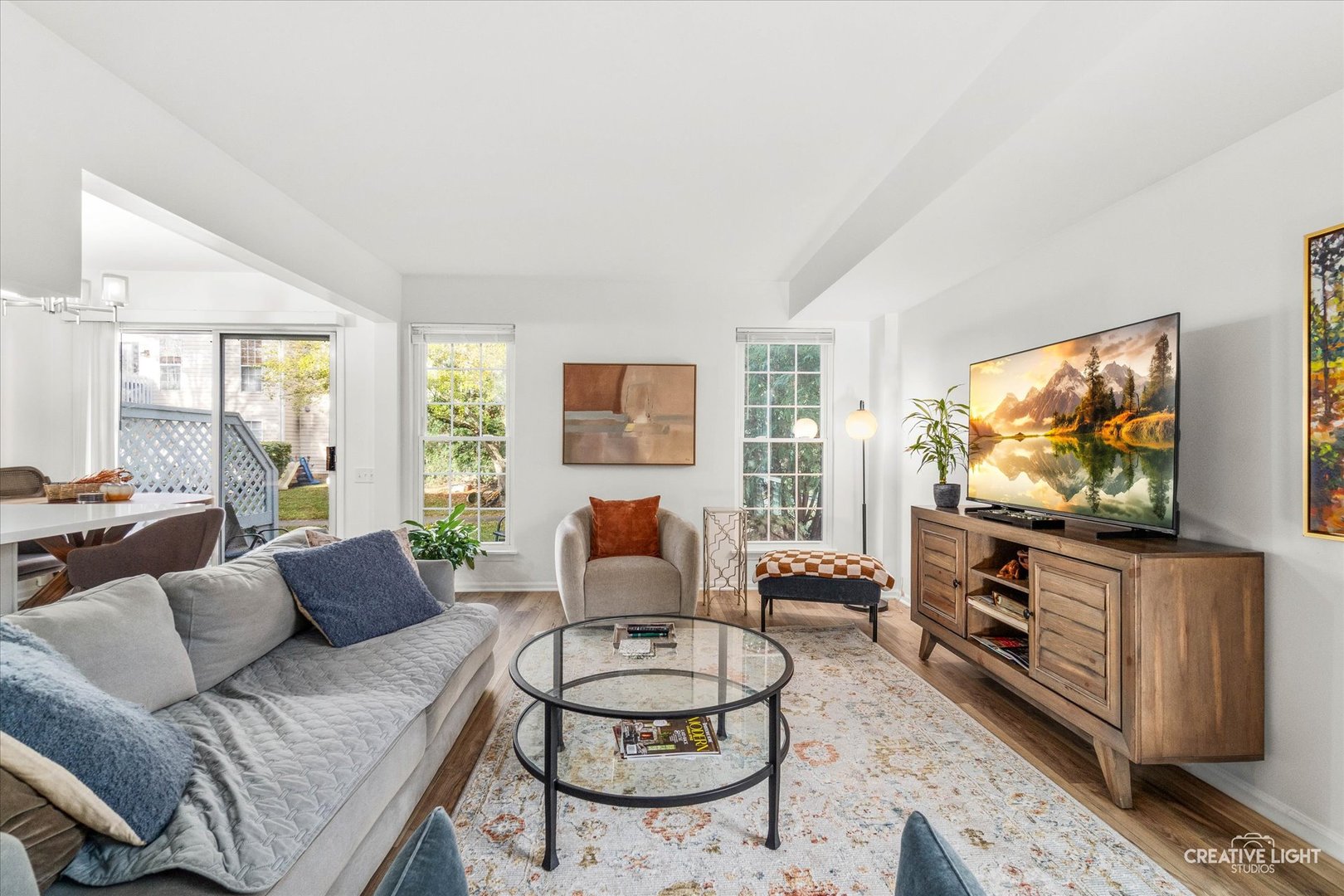 170 Half Moon Circle Aurora, IL 60504 - Photo 4 of 15 a living room with furniture and a flat screen tv