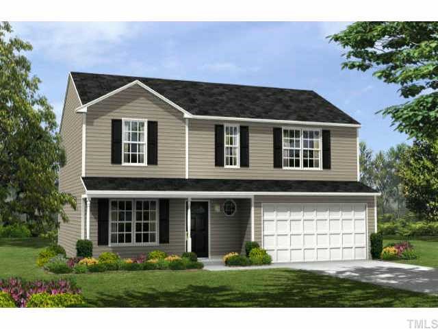 3429 Dutchman Road Raleigh, NC 27610 - Photo 1 of 1 a front view of a house with a yard