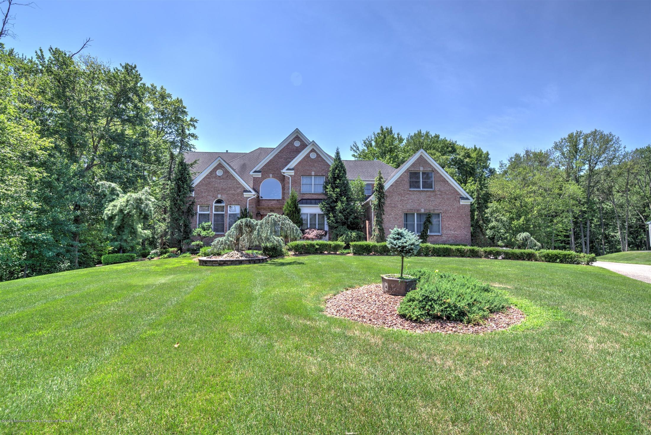 143 Millhurst Road Manalapan, NJ 07726 - Photo 2 of 56 47-FRONT