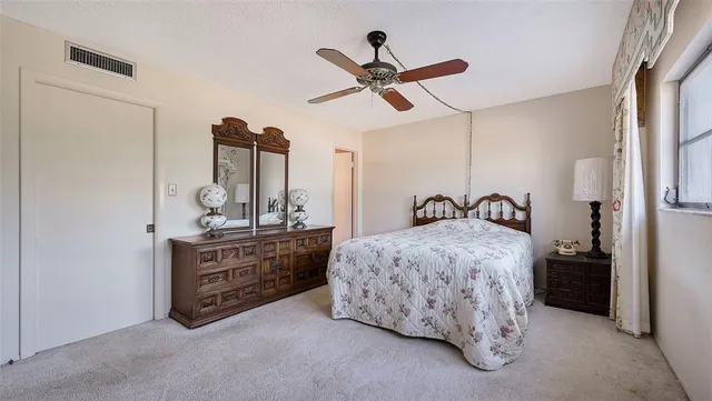 a view of a lake with building in front of it