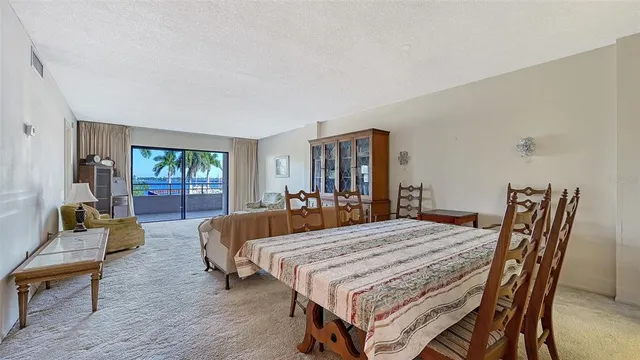 a bedroom with a bed and a table in it