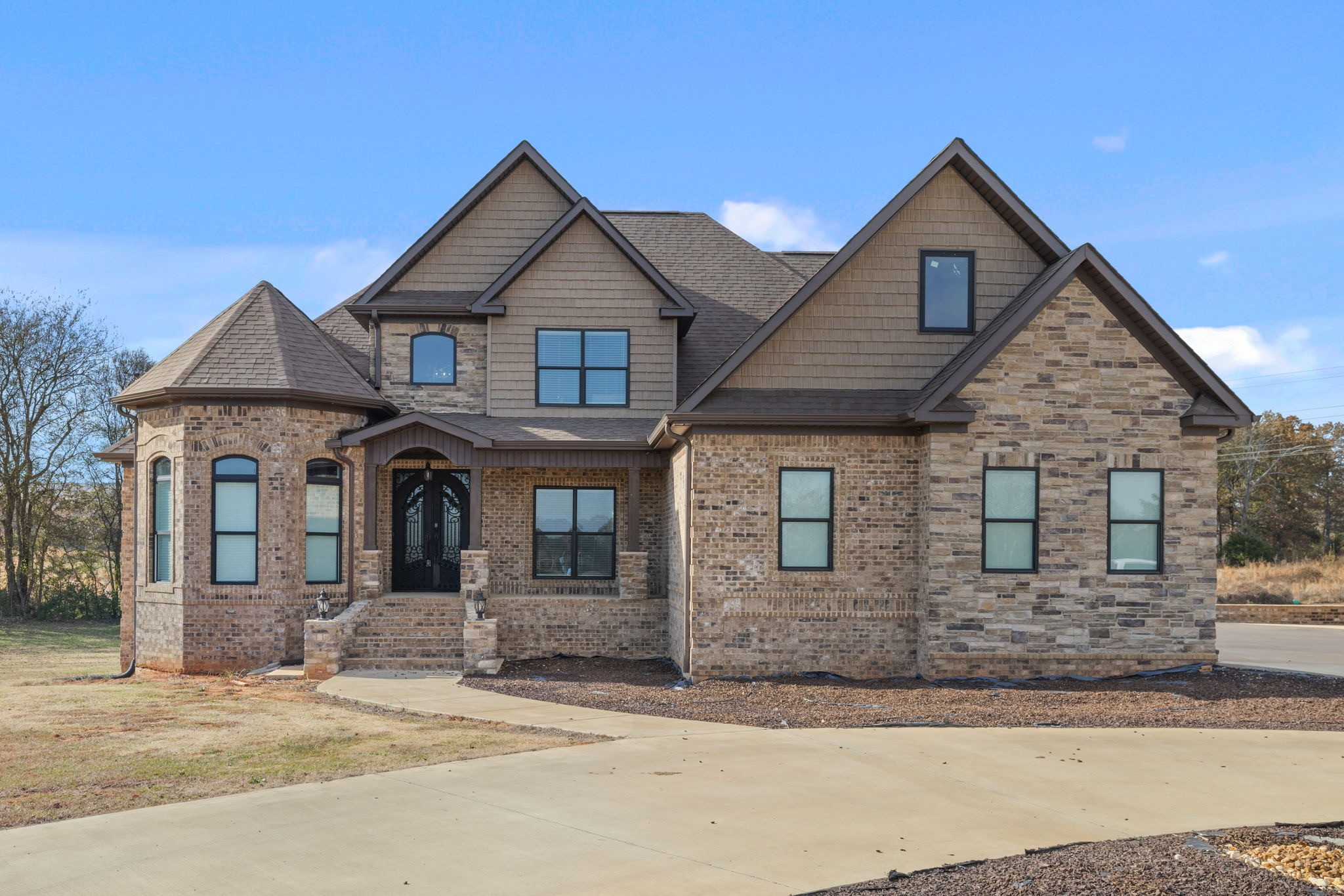 174 Isom Drive Cherokee, AL 35616 - Photo 1 of 50 a front view of a house with garden