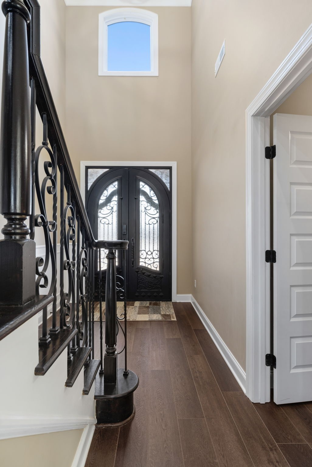 174 Isom Drive Cherokee, AL 35616 - Photo 12 of 50 a view of a hallway with wooden floor and stairs