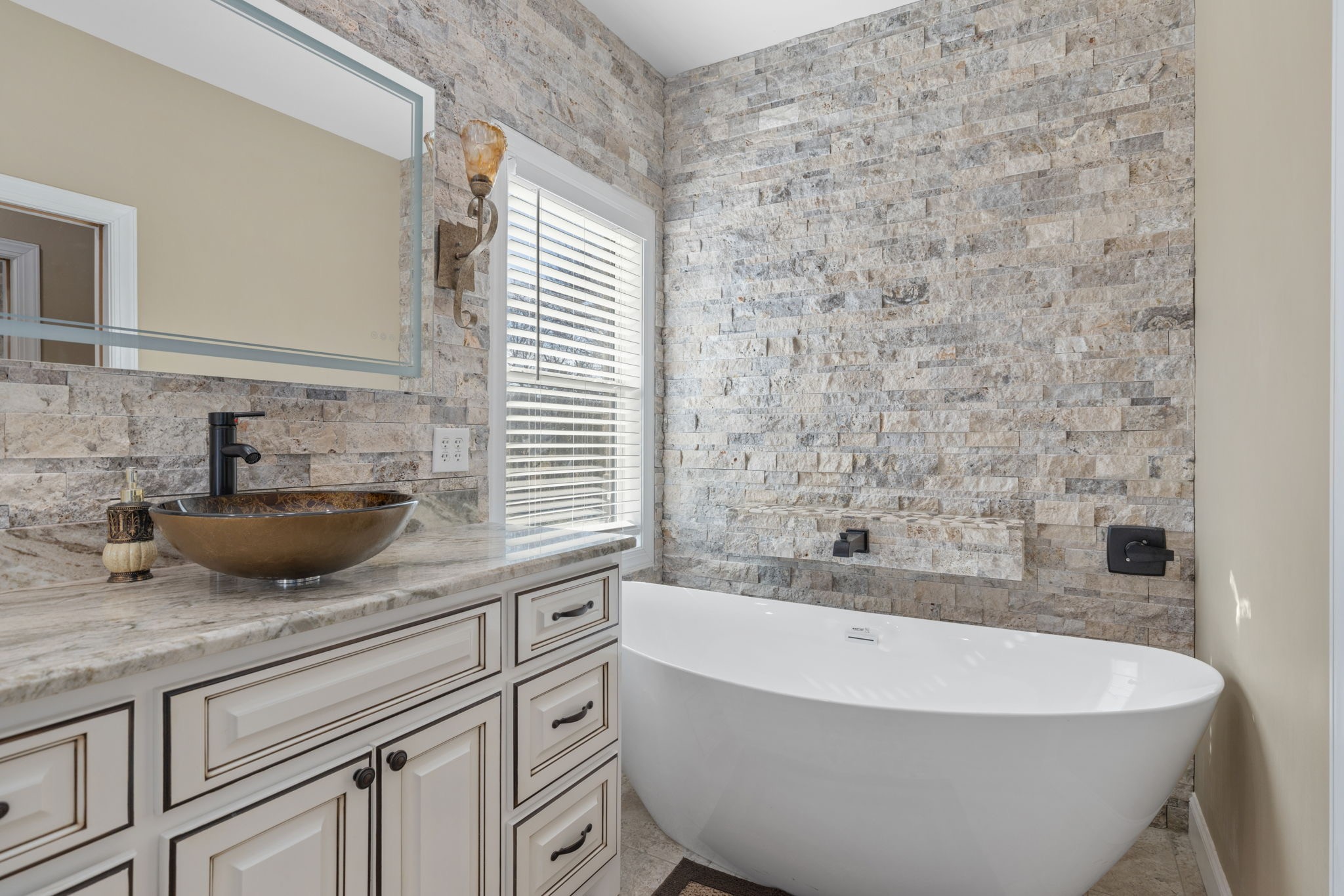 174 Isom Drive Cherokee, AL 35616 - Photo 18 of 50 a bathroom with a bathtub and sink