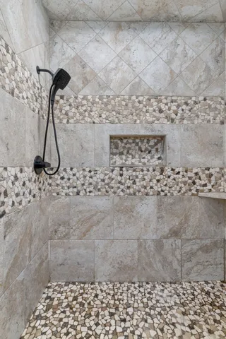 a bathroom with a sink a vanity and a mirror