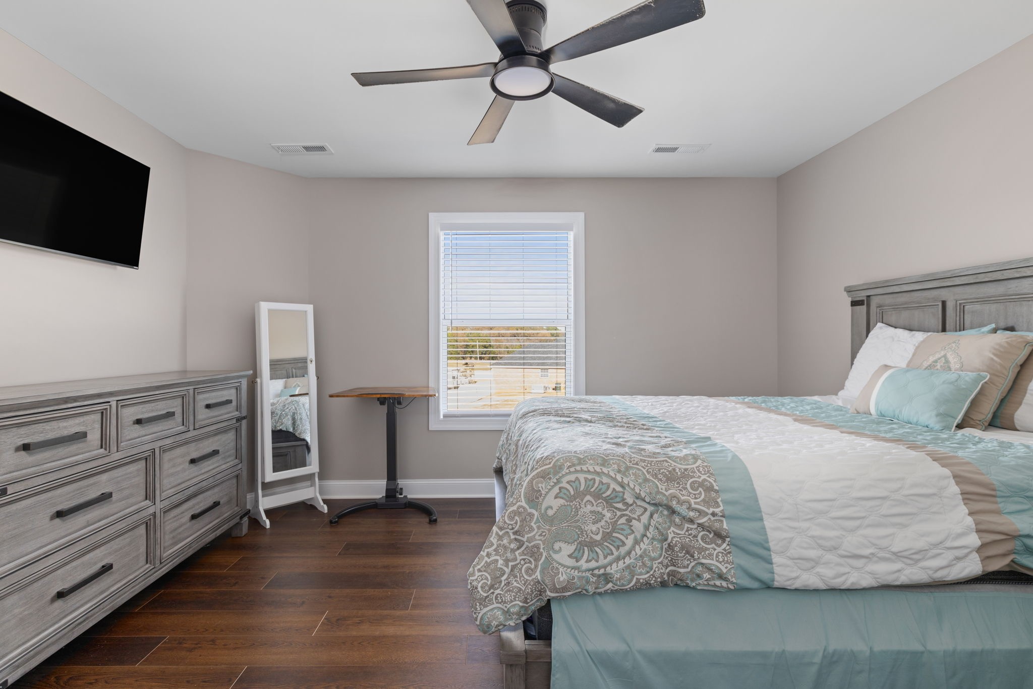 174 Isom Drive Cherokee, AL 35616 - Photo 22 of 50 a bedroom with a bed and a flat screen tv