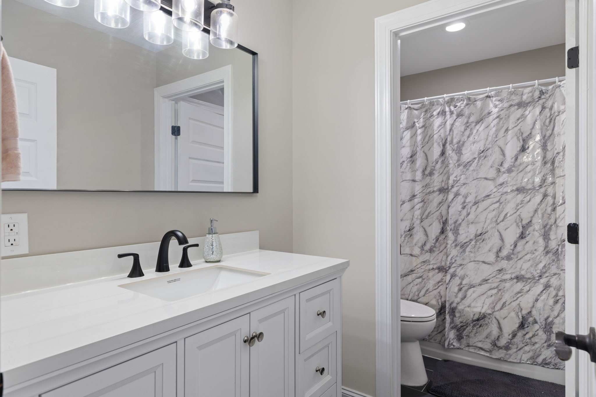 174 Isom Drive Cherokee, AL 35616 - Photo 23 of 50 a bathroom with a sink and a mirror