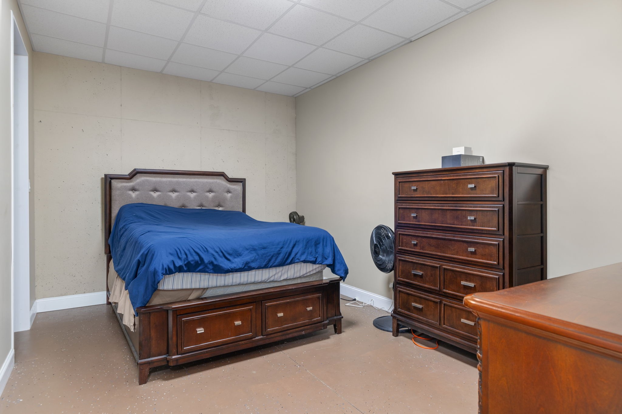 174 Isom Drive Cherokee, AL 35616 - Photo 25 of 50 a bedroom with a bed and a dressers