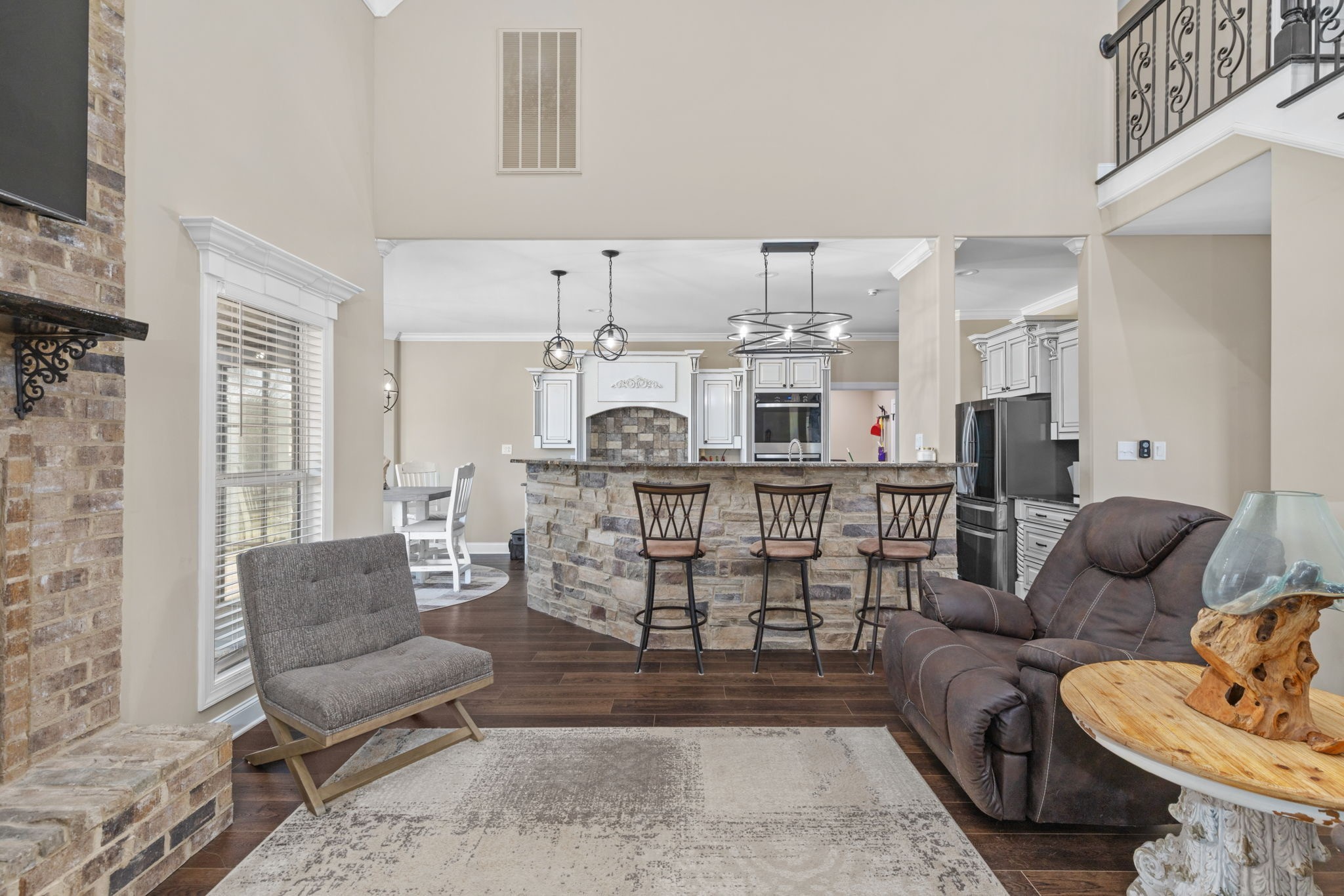 174 Isom Drive Cherokee, AL 35616 - Photo 3 of 50 a living room with furniture and a dining table with kitchen view
