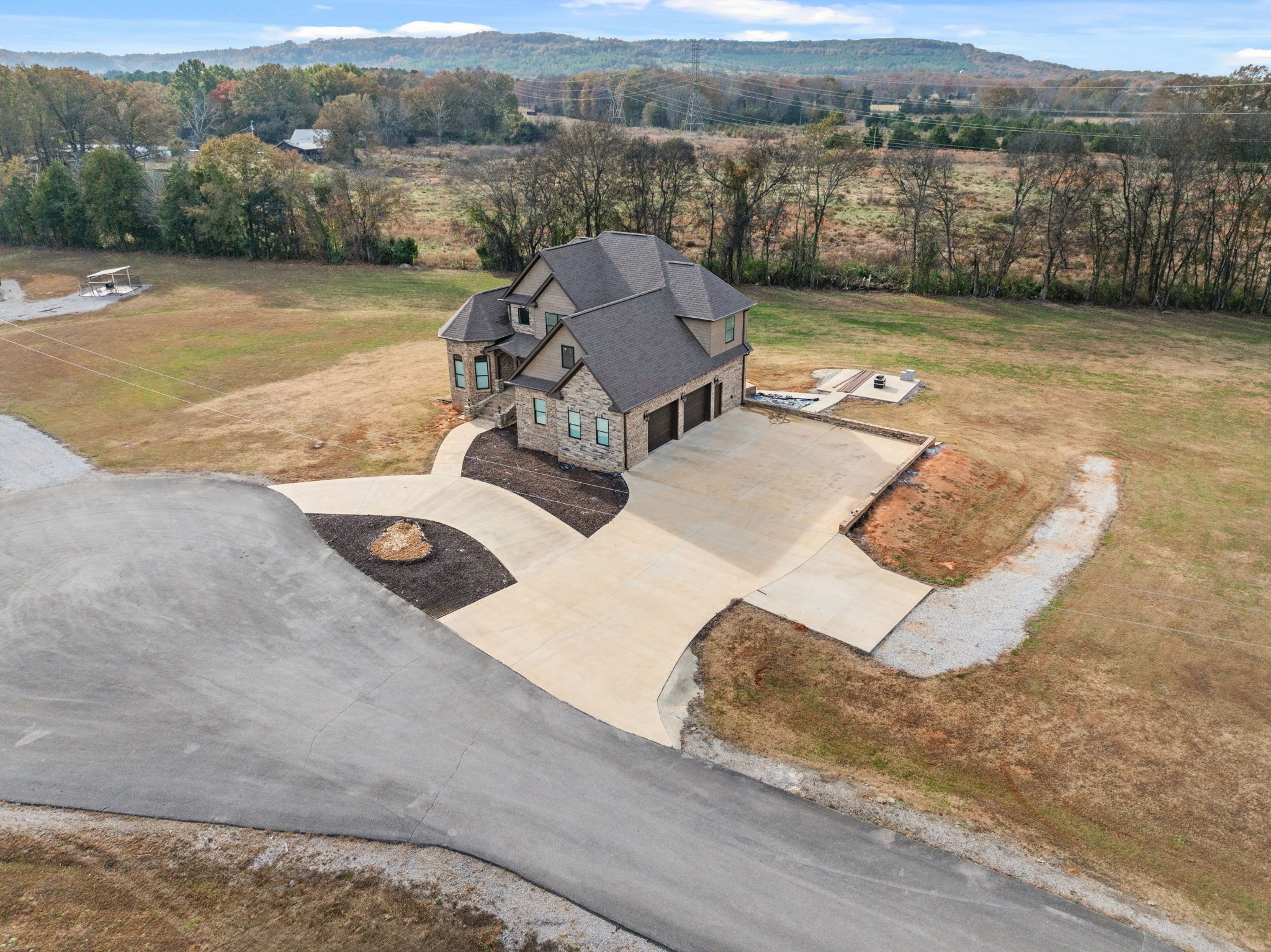 174 Isom Drive Cherokee, AL 35616 - Photo 31 of 50 an aerial view of a house with a yard