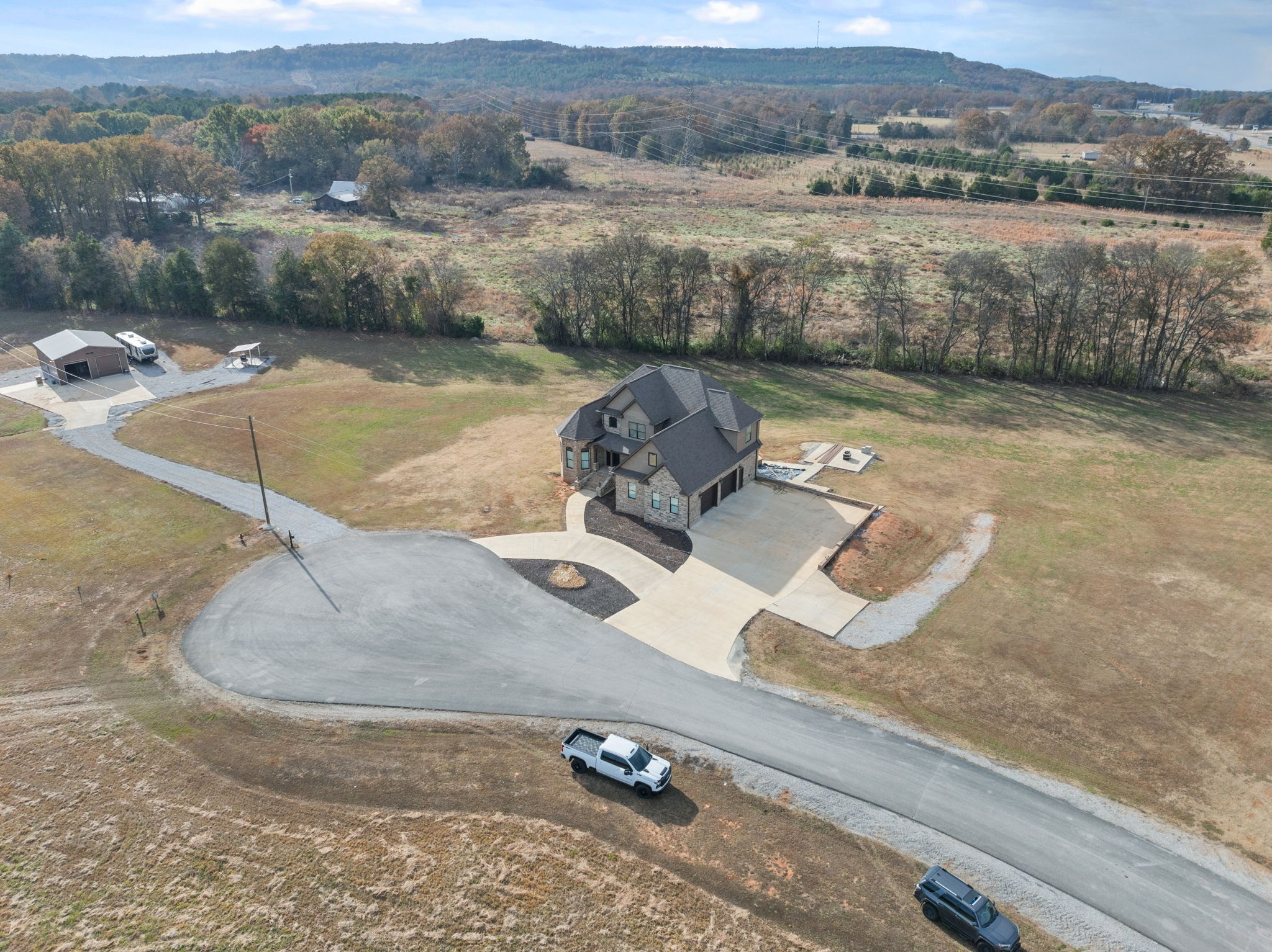 174 Isom Drive Cherokee, AL 35616 - Photo 32 of 50 a view of a lake with a mountain in the background
