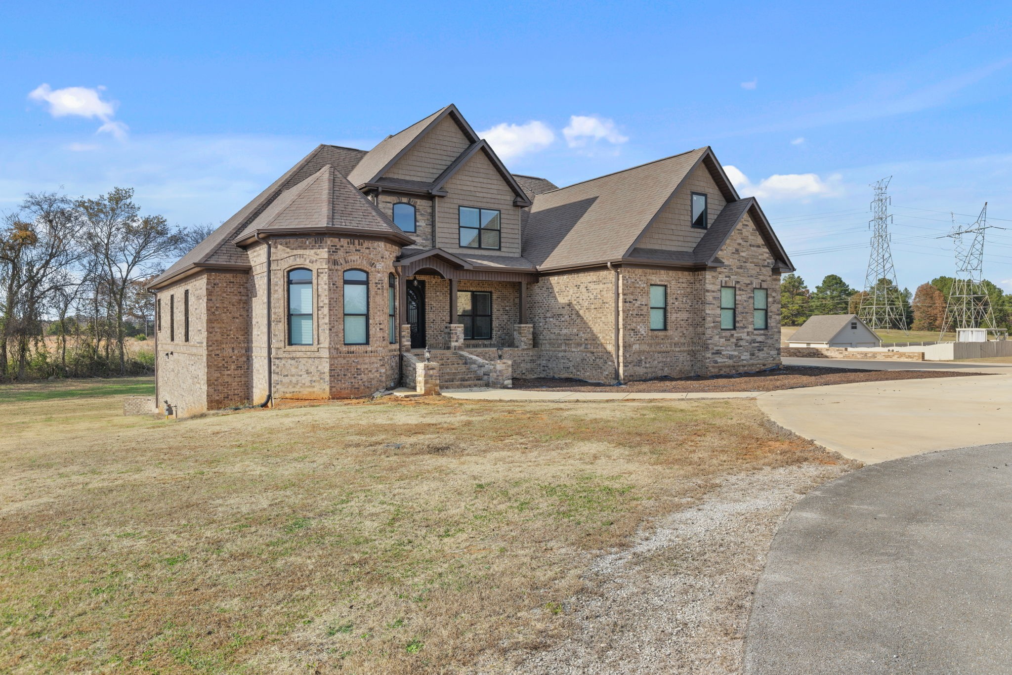 174 Isom Drive Cherokee, AL 35616 - Photo 38 of 50 front view of a house with a yard