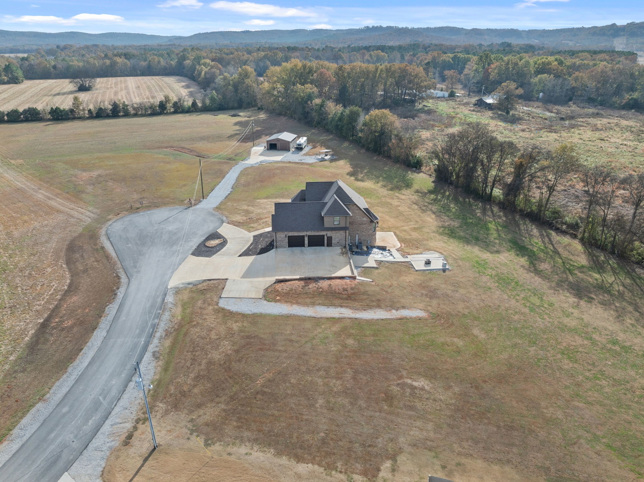 174 Isom Drive Cherokee, AL 35616 - Photo 41 of 50 an aerial view of a house with a yard