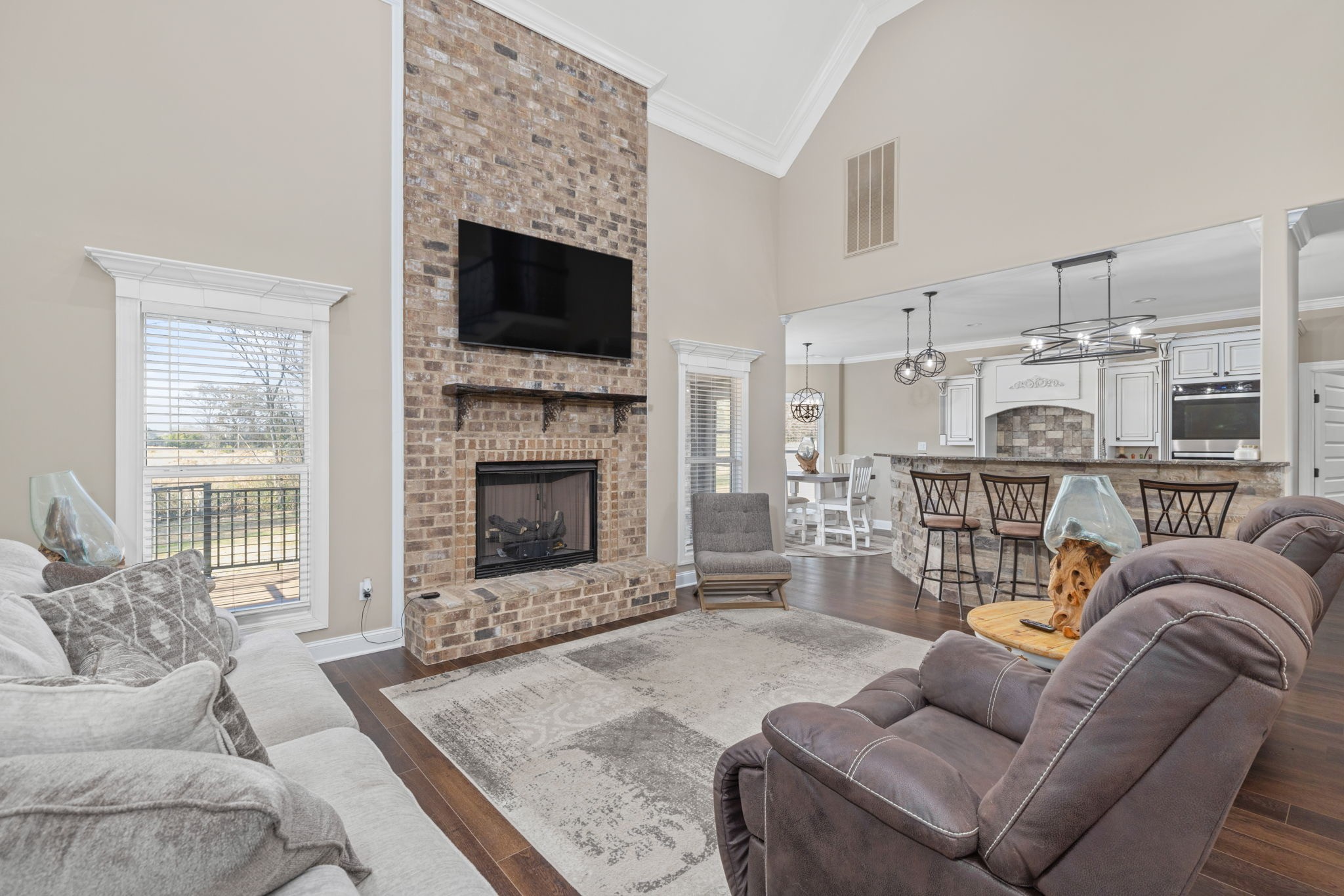 174 Isom Drive Cherokee, AL 35616 - Photo 8 of 50 a living room with furniture a flat screen tv and a fireplace