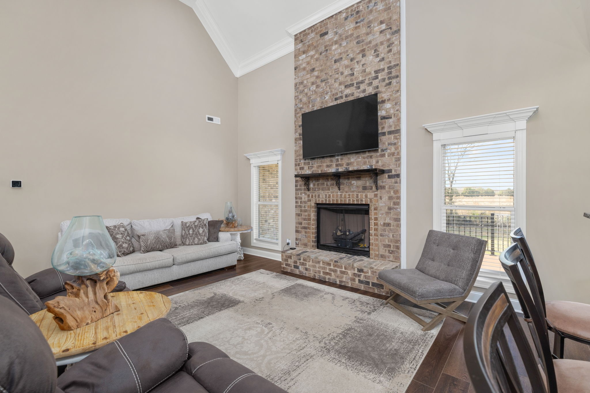 174 Isom Drive Cherokee, AL 35616 - Photo 9 of 50 a living room with furniture a flat screen tv and a fireplace