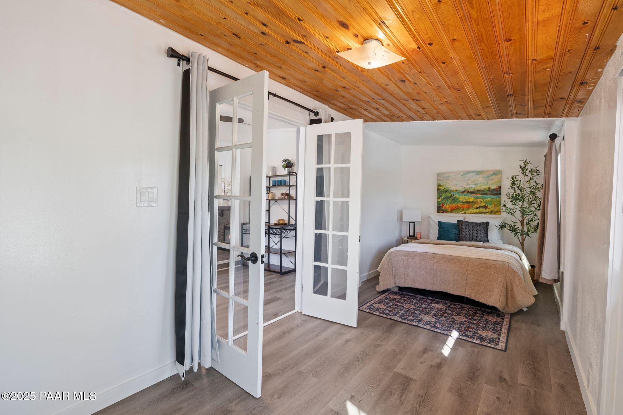 1420 White Spar Road Prescott, AZ 86303 - Photo 13 of 24 a bedroom with a bed and a window