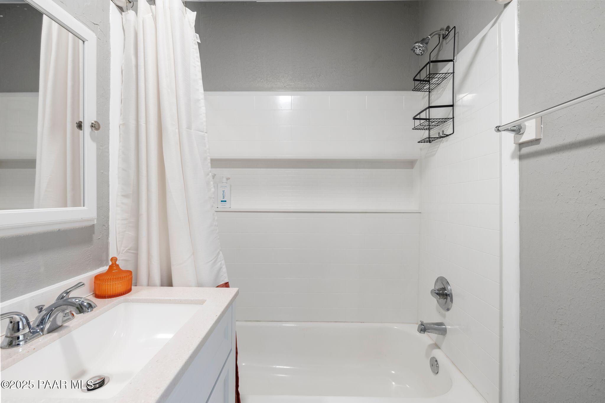 1420 White Spar Road Prescott, AZ 86303 - Photo 16 of 24 a bathroom with a tub and shower