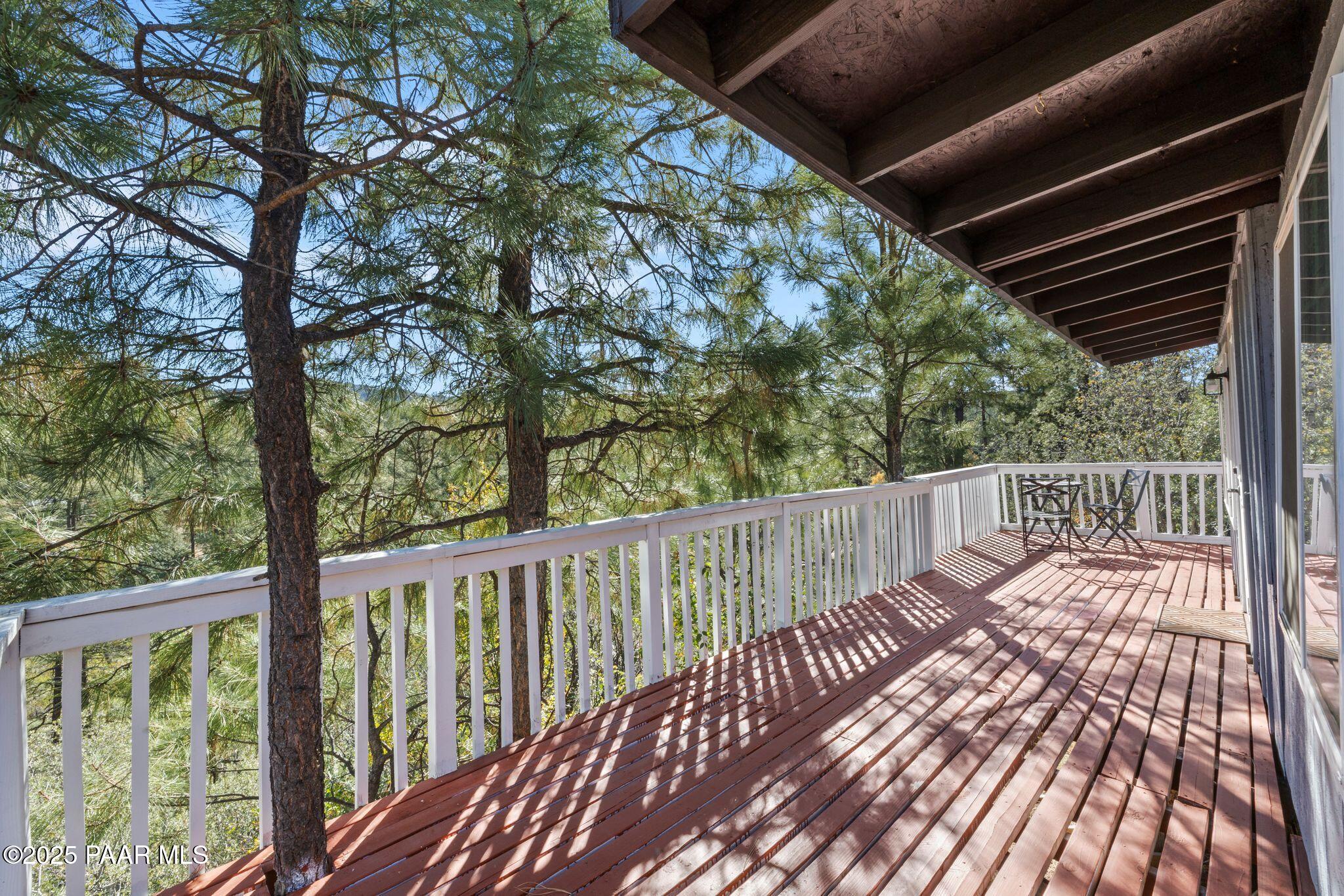 1420 White Spar Road Prescott, AZ 86303 - Photo 20 of 24 a balcony with wooden floor and fence