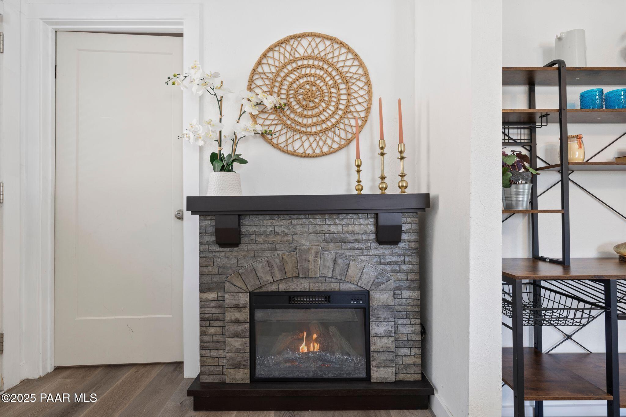 1420 White Spar Road Prescott, AZ 86303 - Photo 7 of 24 a stone fireplace with a mirror