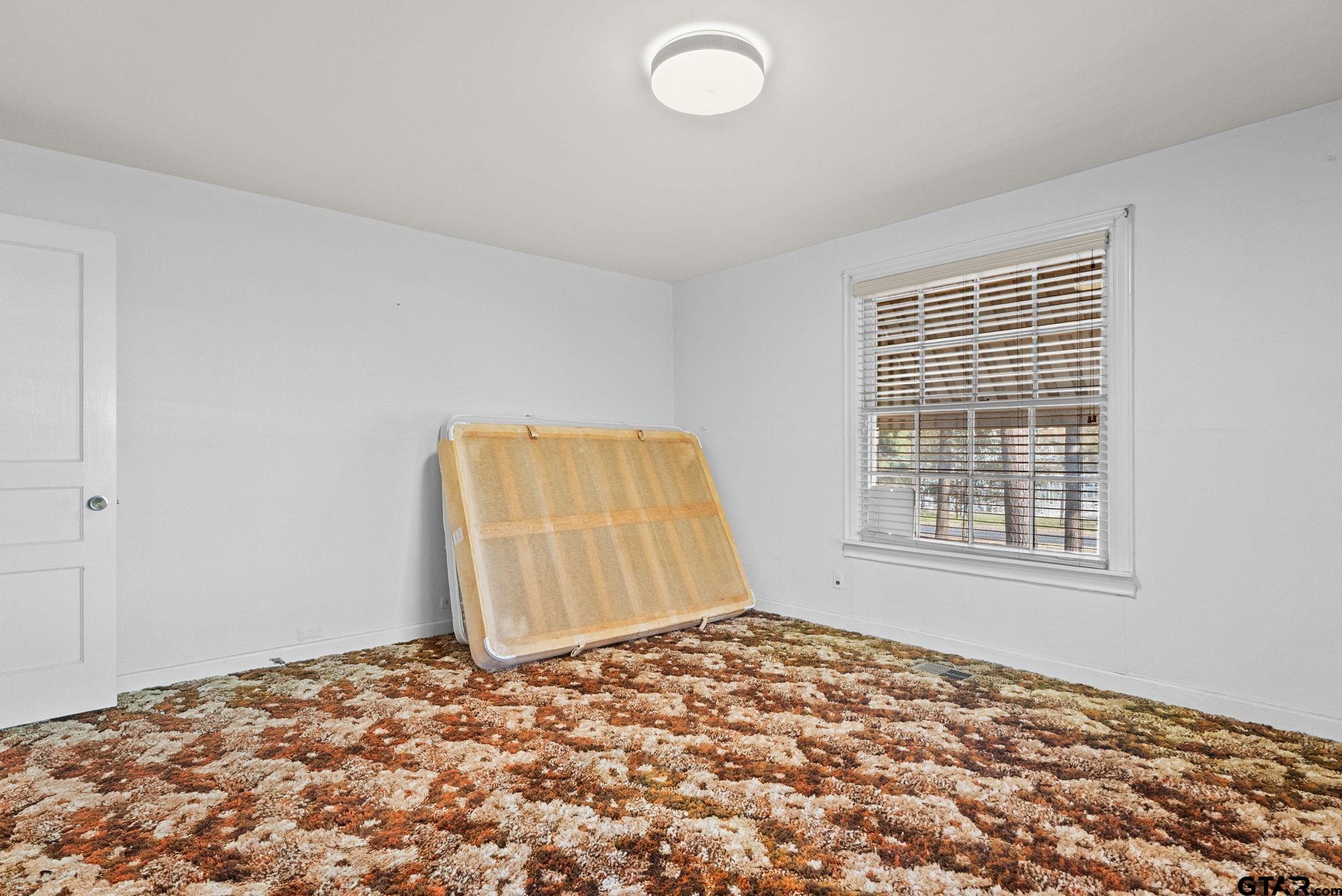 3819 Old Chandler Road Tyler, TX 75702 - Photo 14 of 30 a view of a bedroom