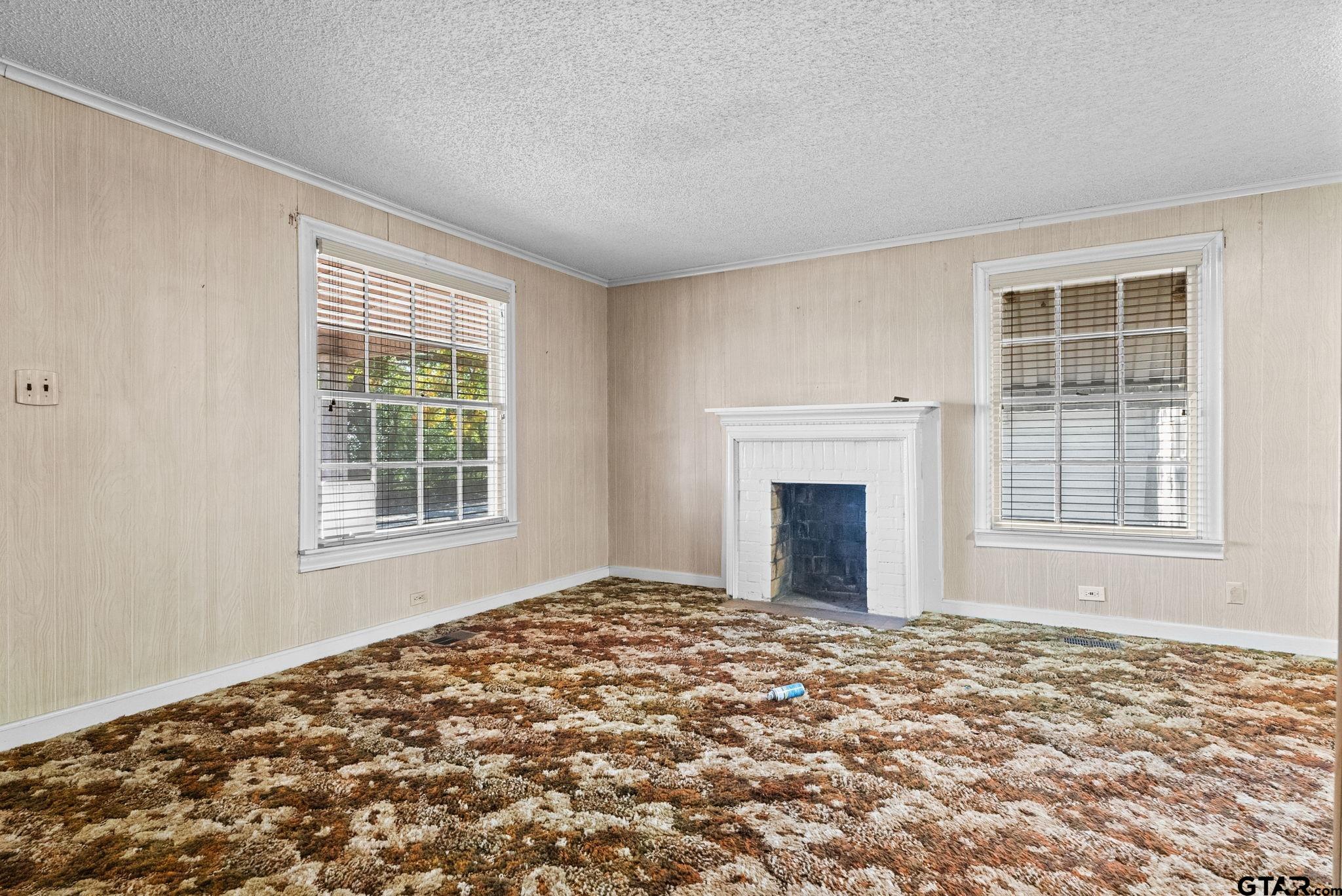 3819 Old Chandler Road Tyler, TX 75702 - Photo 17 of 30 a view of empty room with windows