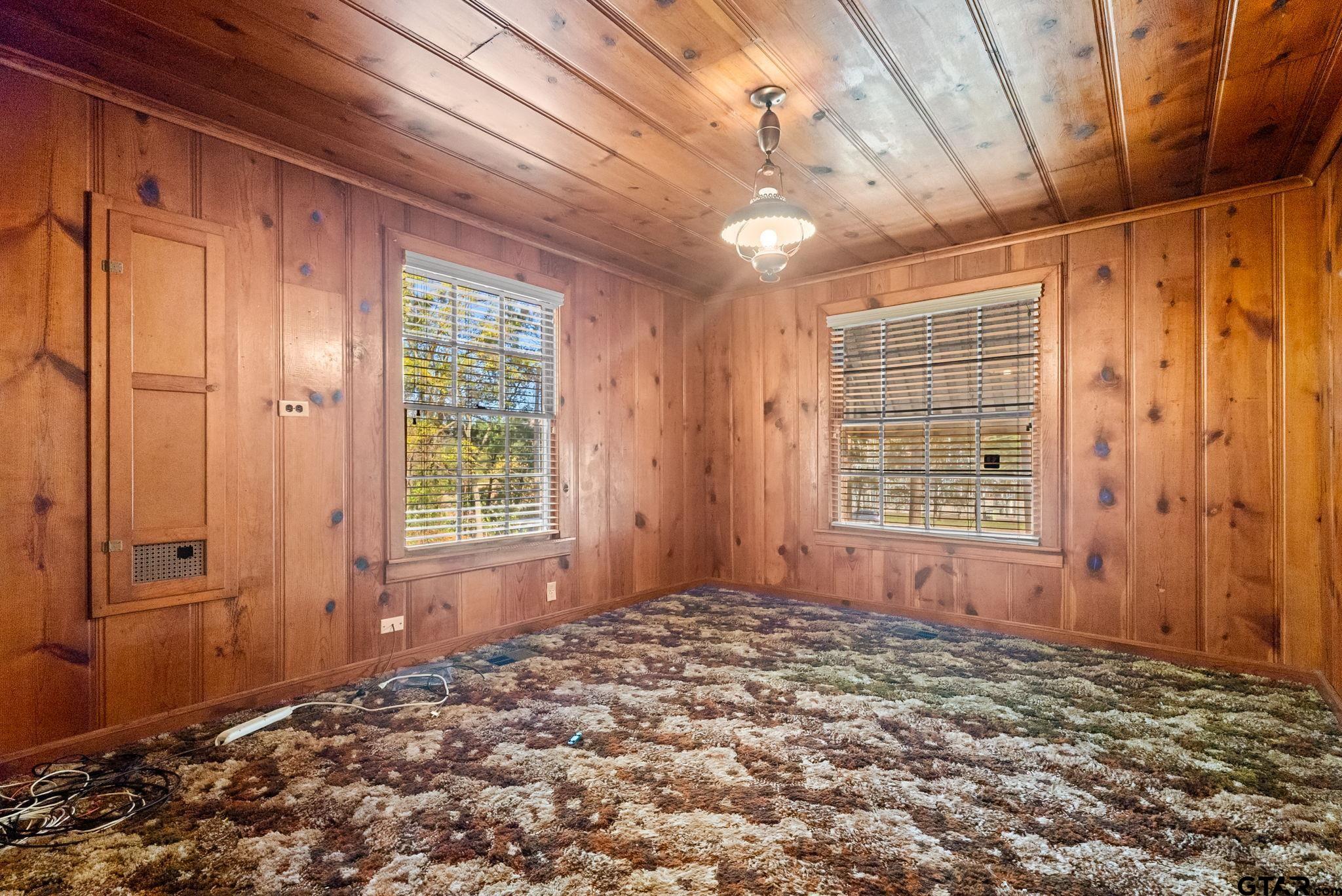 3819 Old Chandler Road Tyler, TX 75702 - Photo 7 of 30 a view of an empty room with a window