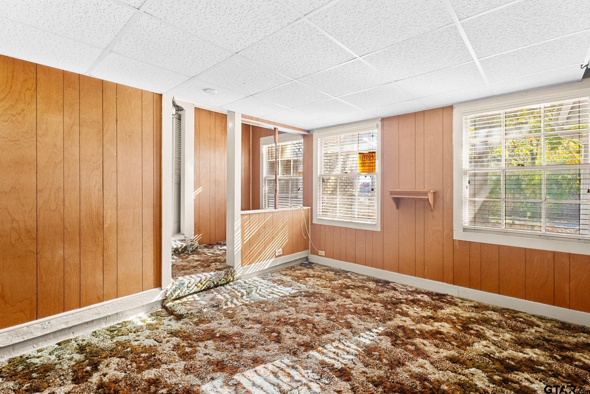 3819 Old Chandler Road Tyler, TX 75702 - Photo 10 of 30 a view of a room with a large window
