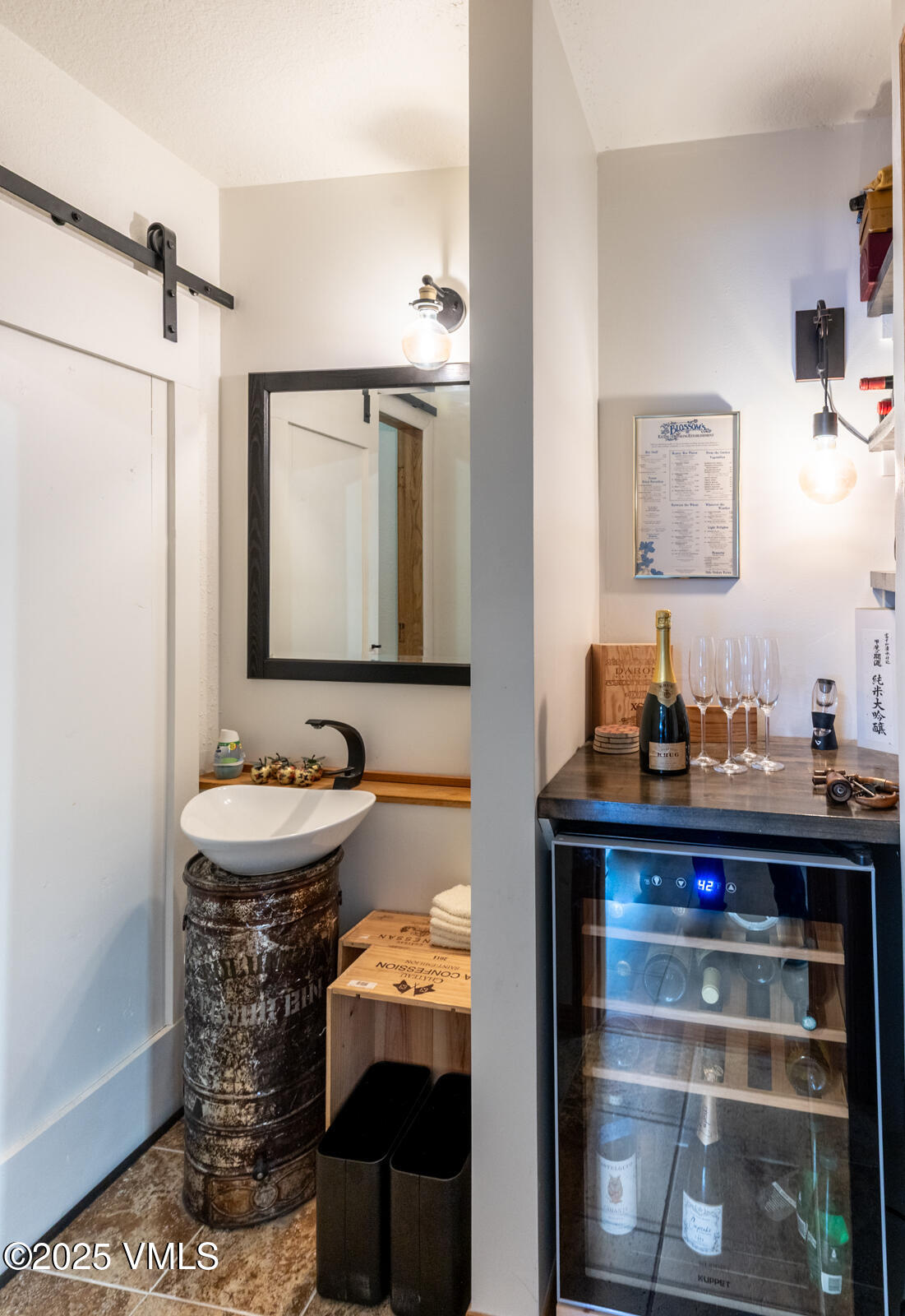 3016 Wildridge Road, Unit 6 Avon, CO 81620 - Photo 13 of 38 a bathroom with a sink and a mirror