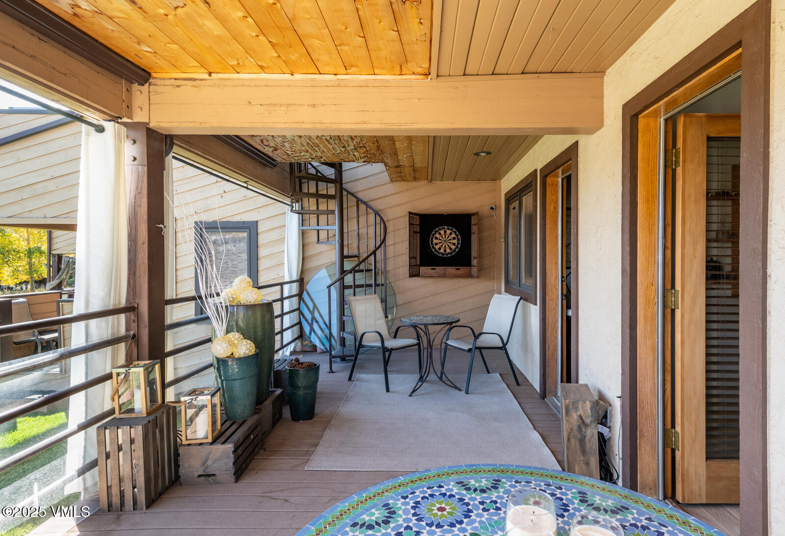 3016 Wildridge Road, Unit 6 Avon, CO 81620 - Photo 27 of 38 a view of a porch with furniture