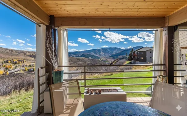 a room view with a flat screen tv