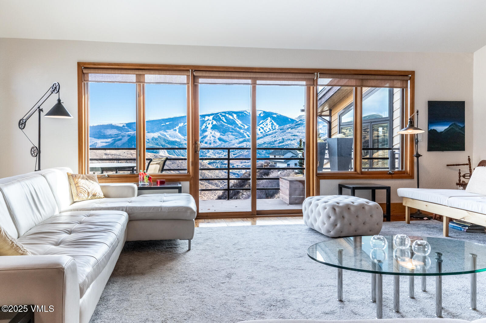 3016 Wildridge Road, Unit 6 Avon, CO 81620 - Photo 3 of 38 a living room with furniture and a large window