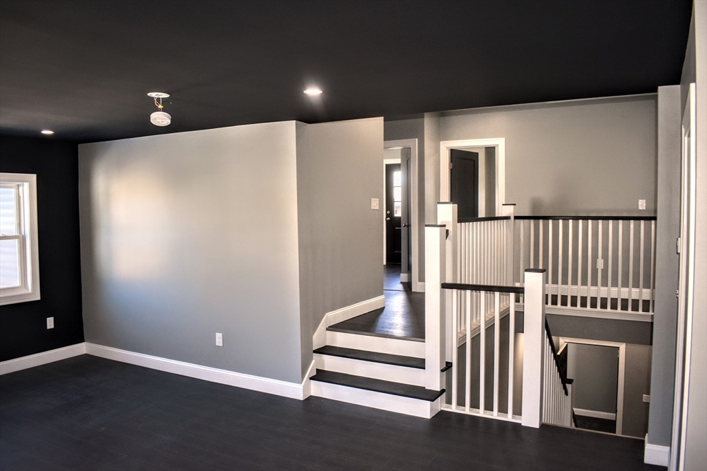 2 Sunnyside Street, Unit 2 Boston, MA 02130 - Photo 16 of 41 a view of entryway with wooden floor