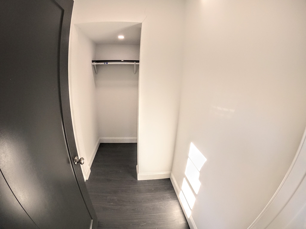 2 Sunnyside Street, Unit 2 Boston, MA 02130 - Photo 23 of 41 a view of a hallway with an empty space