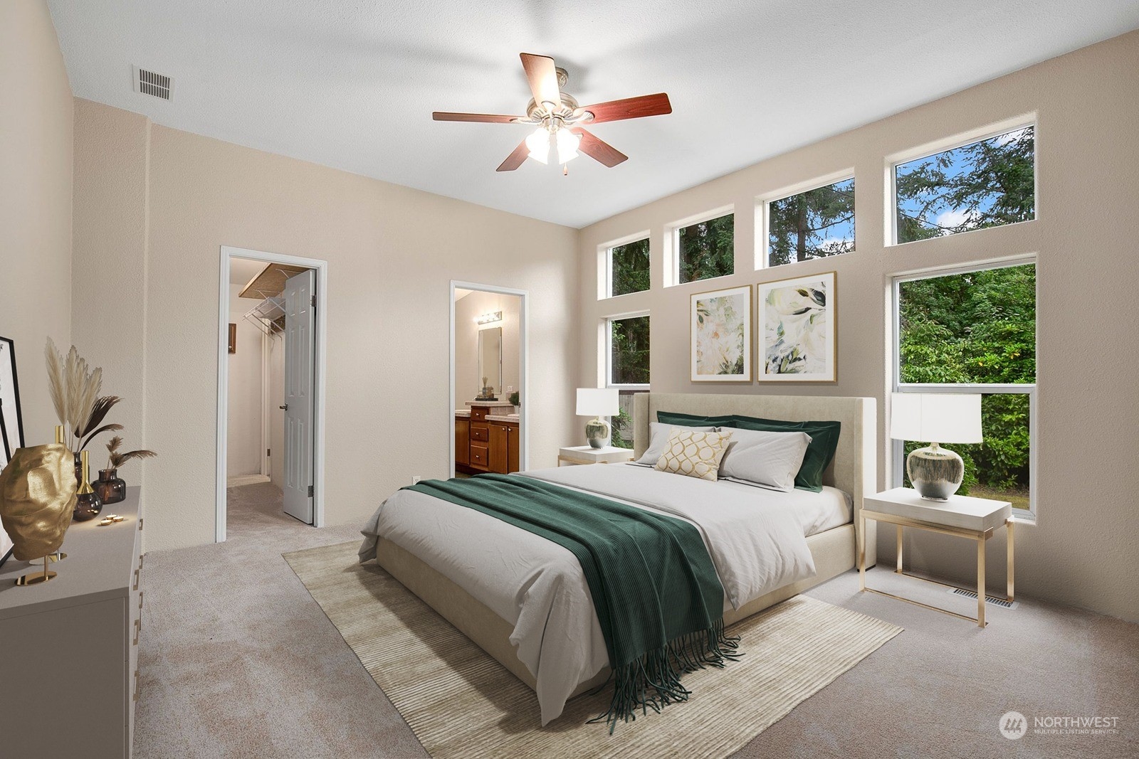 14505 160th Avenue Southeast Renton, WA 98059 - Photo 16 of 38 a bedroom with a large bed and a chandelier