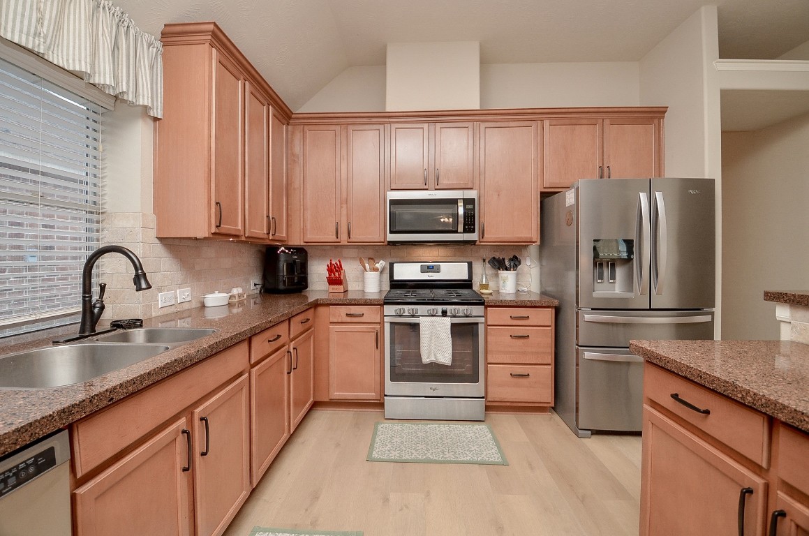 9222 Sorrell Hollow Lane Rosenberg, TX 77469 - Photo 19 of 46 Well-designed layout offers ample prep space, stainless steel appliances, and a functional flow ideal for cooking and entertaining.