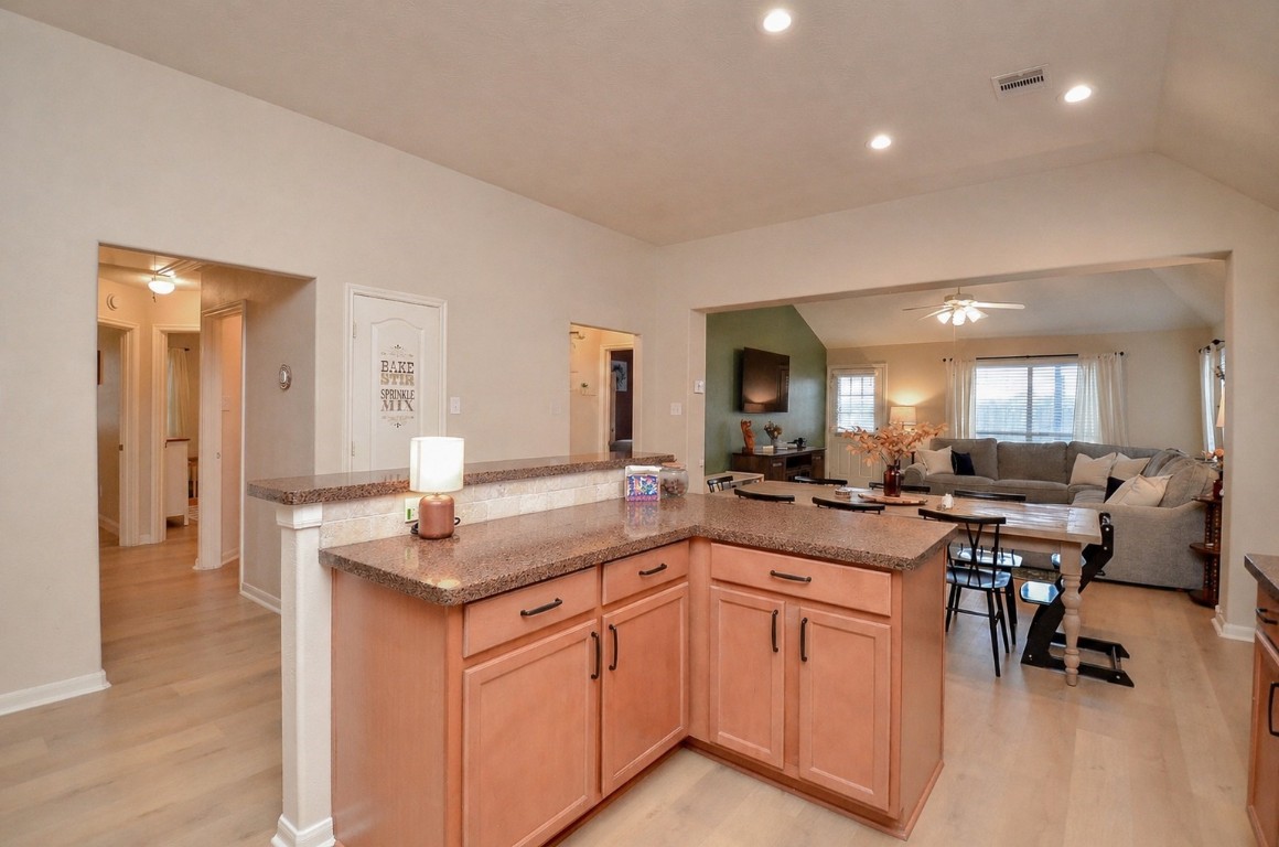 9222 Sorrell Hollow Lane Rosenberg, TX 77469 - Photo 21 of 46 Open-concept kitchen seamlessly connects to the main living areas, creating an inviting space for gathering and entertaining.