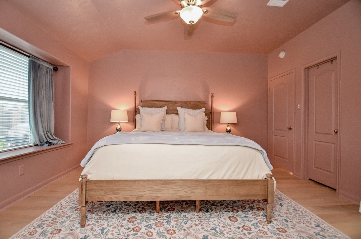 9222 Sorrell Hollow Lane Rosenberg, TX 77469 - Photo 30 of 46 Inviting primary suite featuring a generous layout, large window, and plenty of space for a king-sized bed and furnishings.
