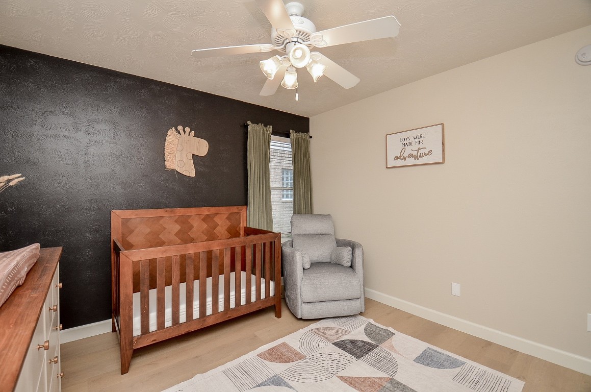 9222 Sorrell Hollow Lane Rosenberg, TX 77469 - Photo 38 of 46 Well-sized secondary bedroom offering versatility for growing families, guests, or a home workspace.