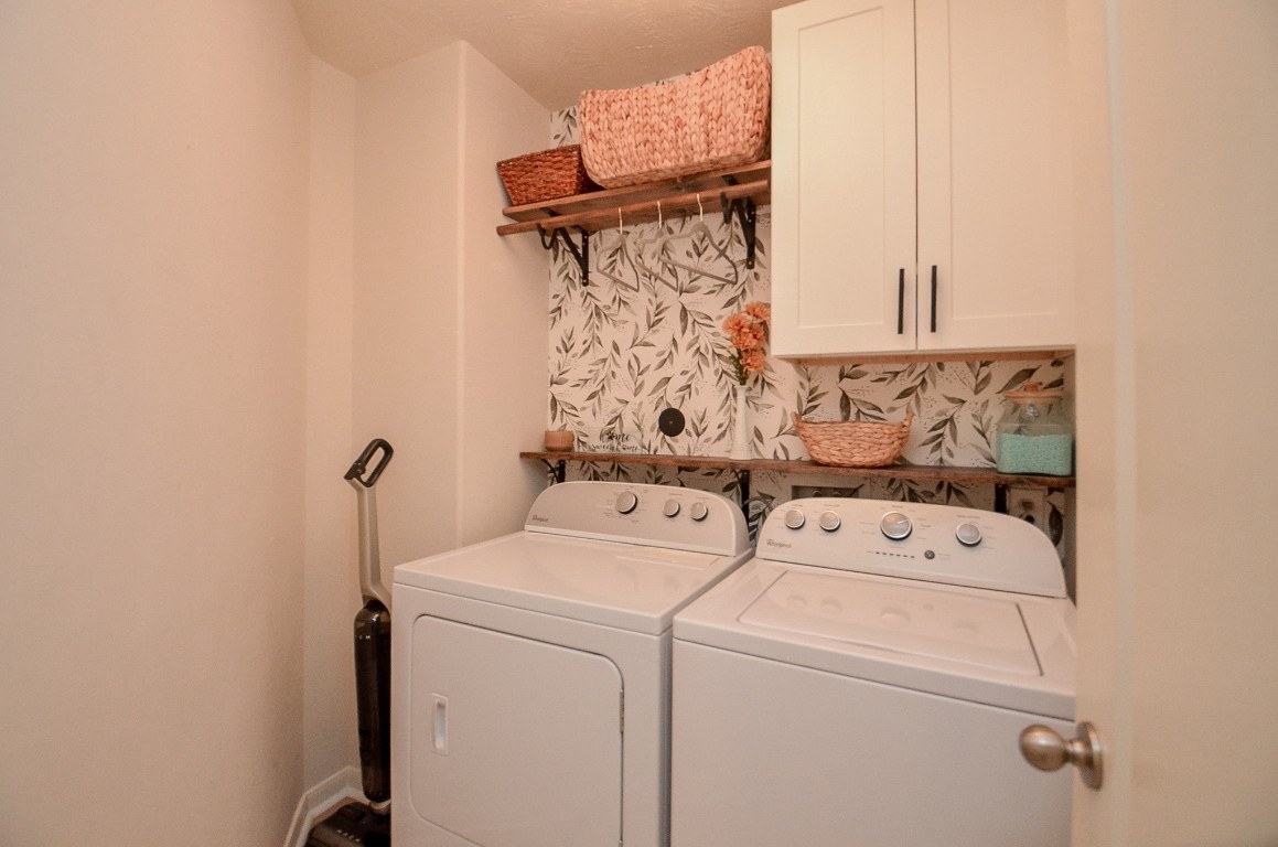 9222 Sorrell Hollow Lane Rosenberg, TX 77469 - Photo 42 of 46 Dedicated laundry room with built-in shelving and cabinetry for added storage and organization.