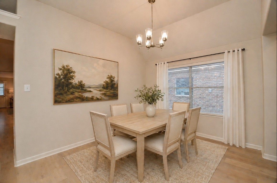 9222 Sorrell Hollow Lane Rosenberg, TX 77469 - Photo 8 of 46 Versatile front room, digitally staged to showcase dining potential, featuring abundant natural light and ideal for use as a formal dining area, home gym, or additional living space. *This image has been virtually staged