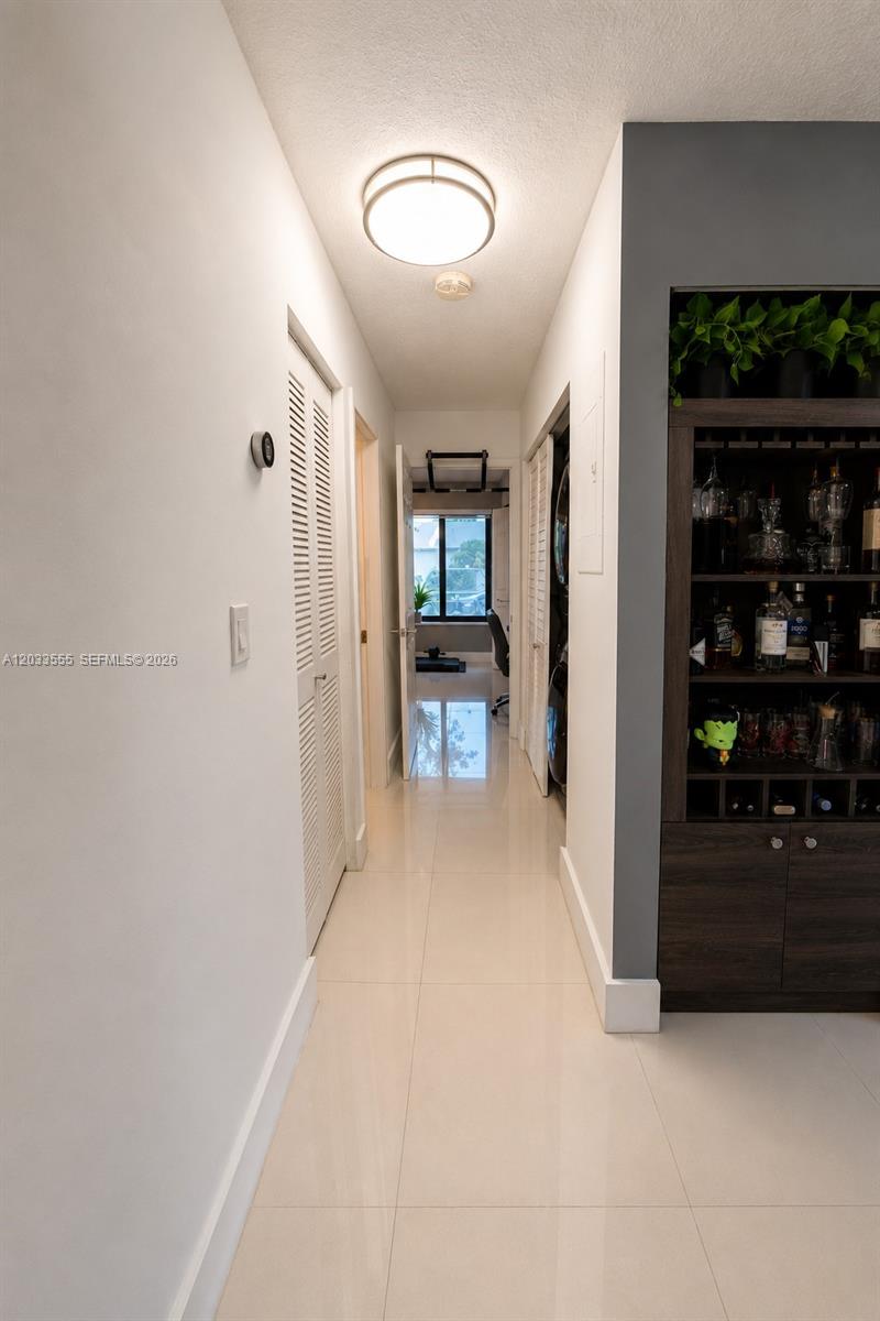 12737 Southwest 68th Terrace Miami, FL 33183 - Photo 14 of 32 Hallway view from primary bedroom door