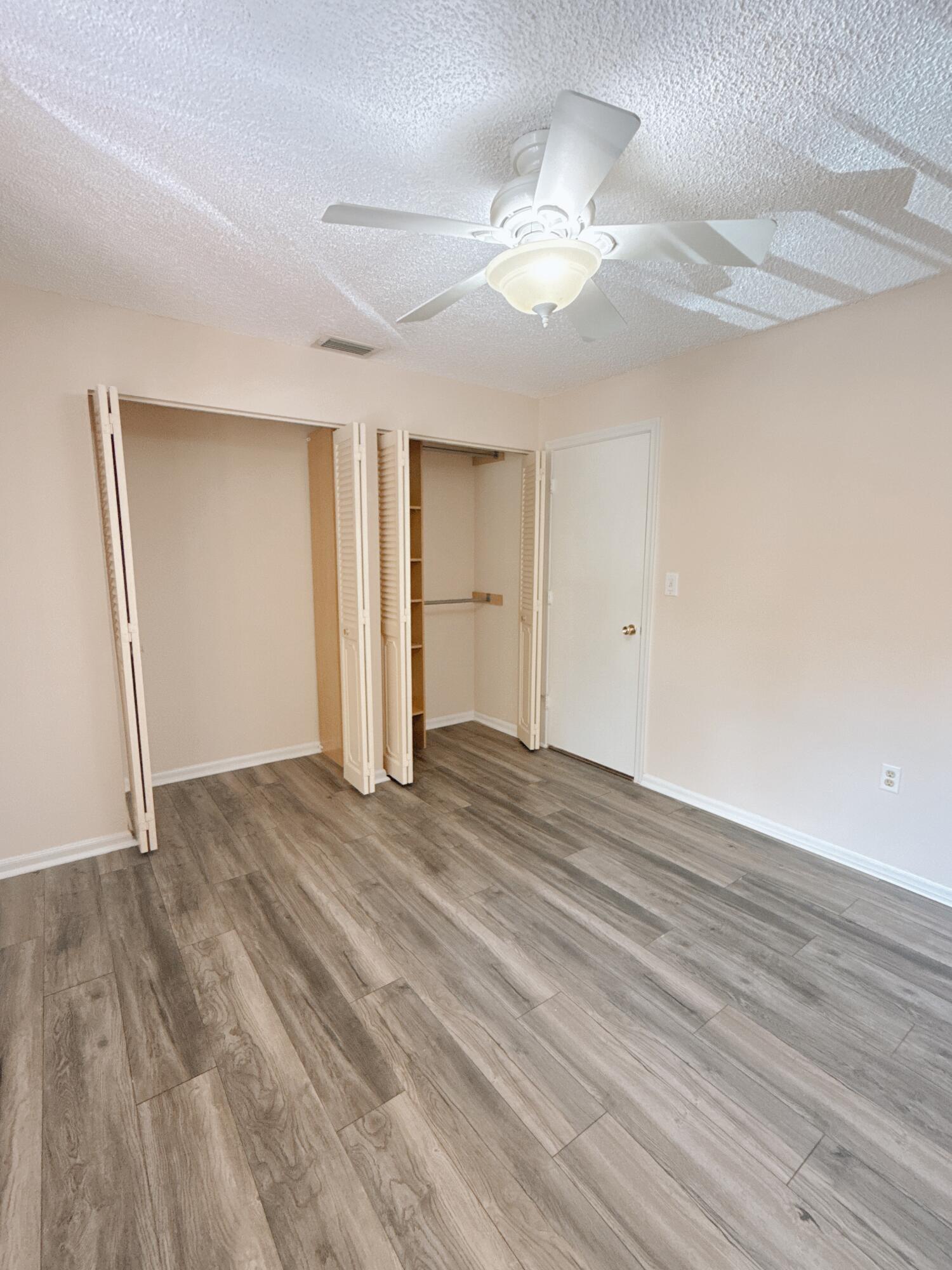 872 Southwest 9th St Circle, Unit 201 Boca Raton, FL 33486 - Photo 5 of 14 Second Bedroom Closet