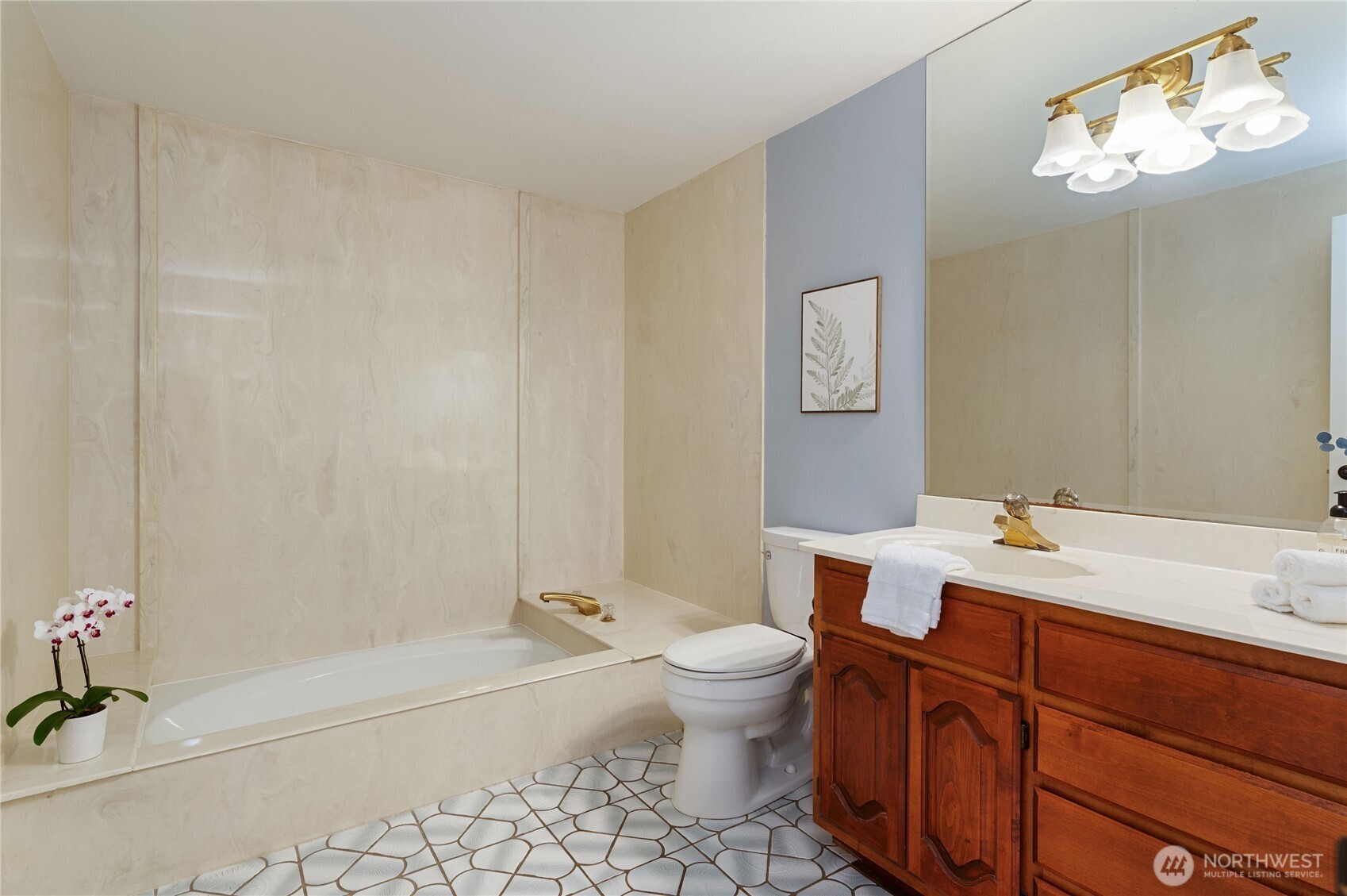 4293 Northwest Westgate Road Silverdale, WA 98383 - Photo 13 of 37 a bathroom with a sink a toilet and bathtub