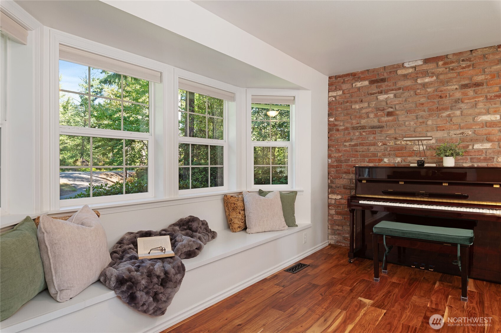 4293 Northwest Westgate Road Silverdale, WA 98383 - Photo 18 of 37 a living room with furniture and a fireplace