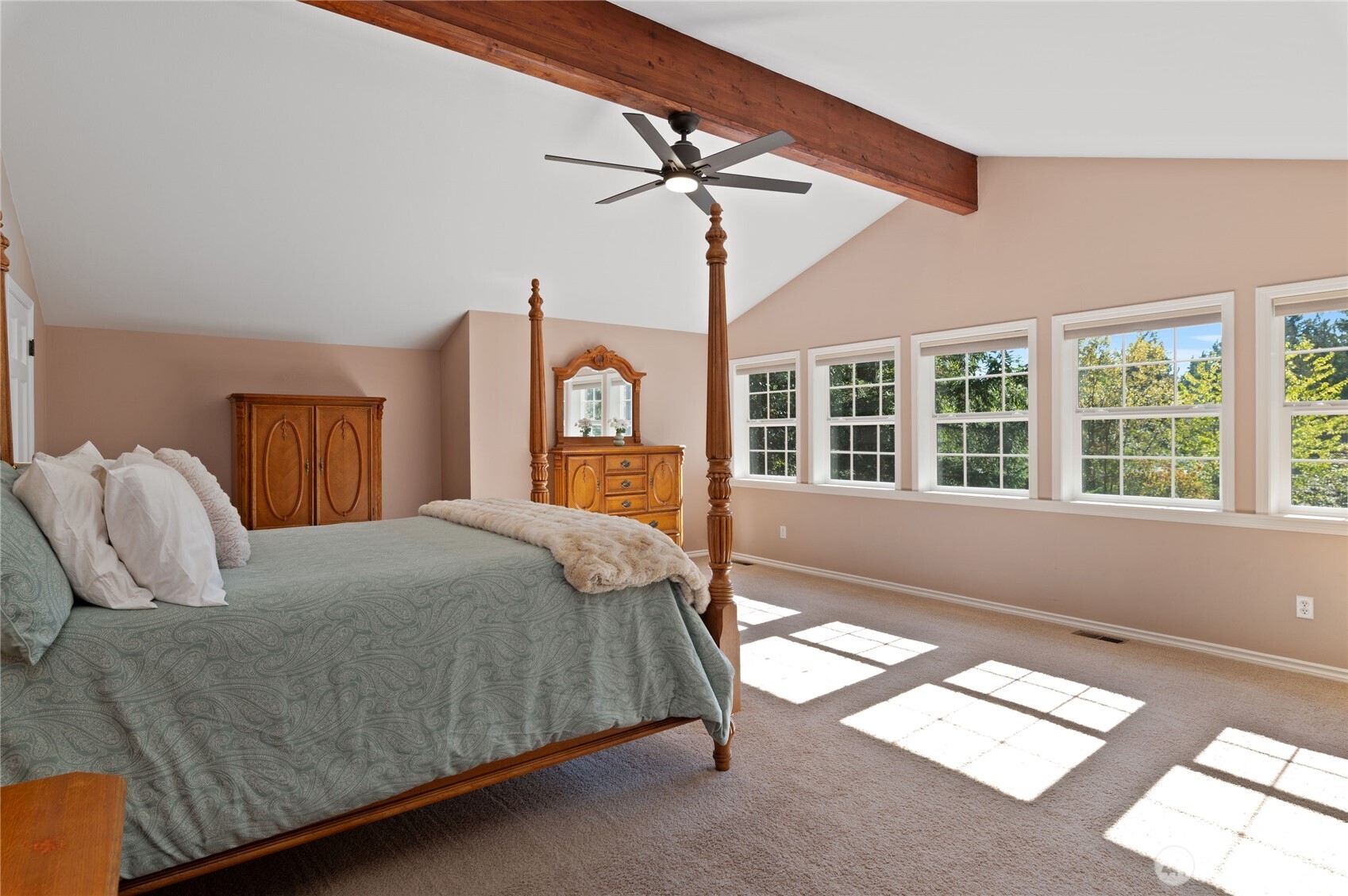 4293 Northwest Westgate Road Silverdale, WA 98383 - Photo 23 of 37 a bedroom with a large bed and wooden floor